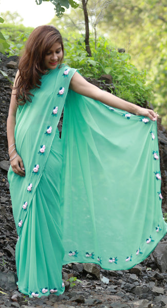 Baby Pink Rose Flowers on a Sea Green Pure Silk Georgette Saree